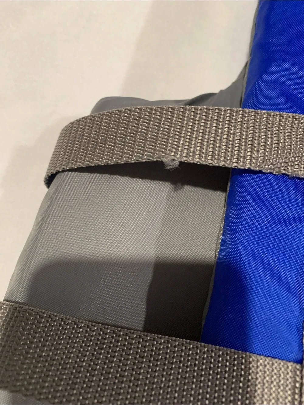 Youth Swim Life Jacket in Royal Blue with Adjustable Gray Straps